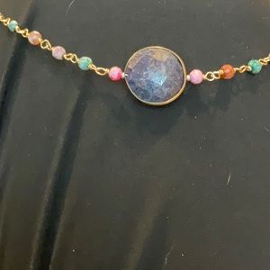 Nakomal Chicago handmade necklace with dark purple center stone